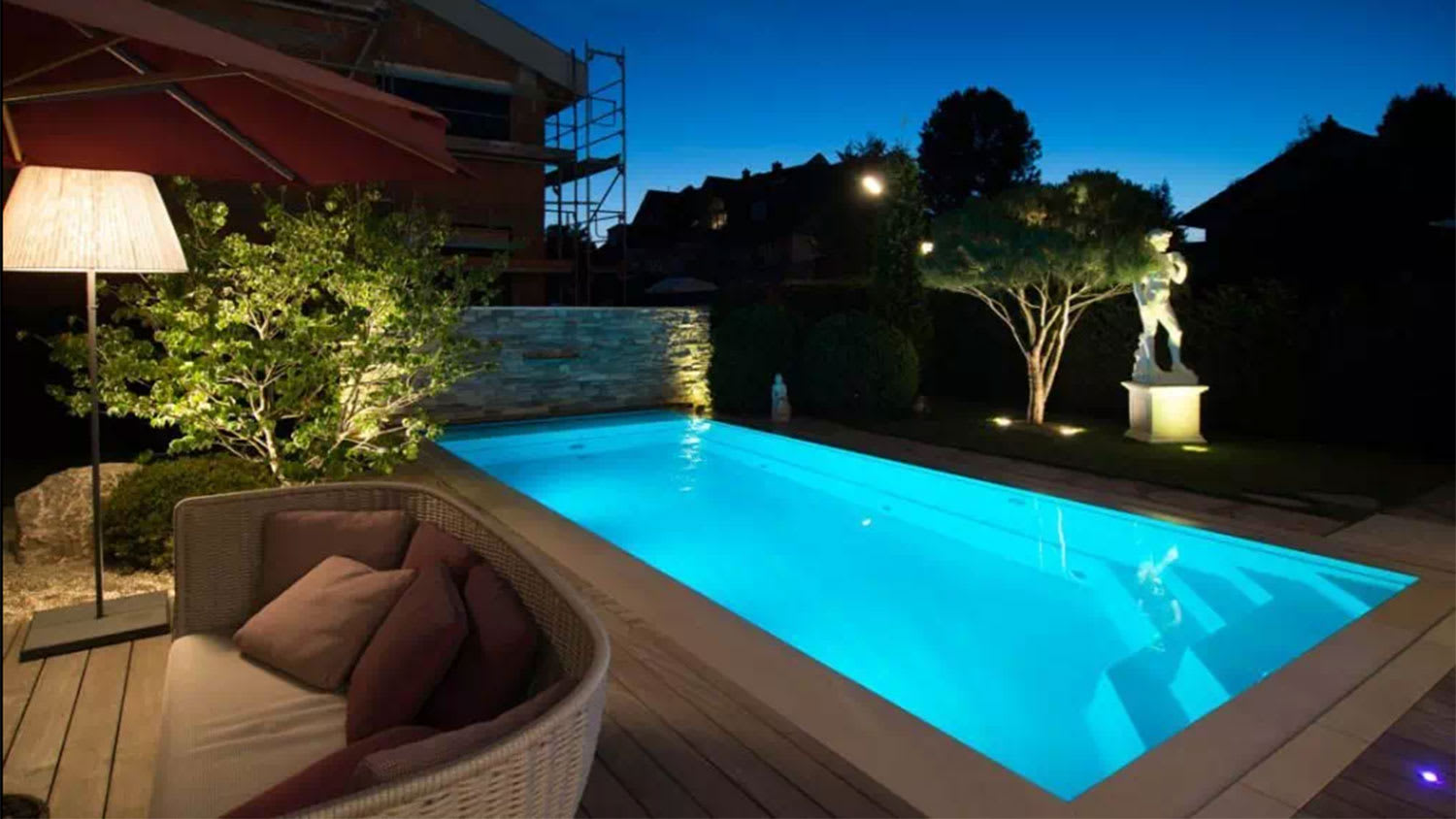 Lap pool with LED lights at night