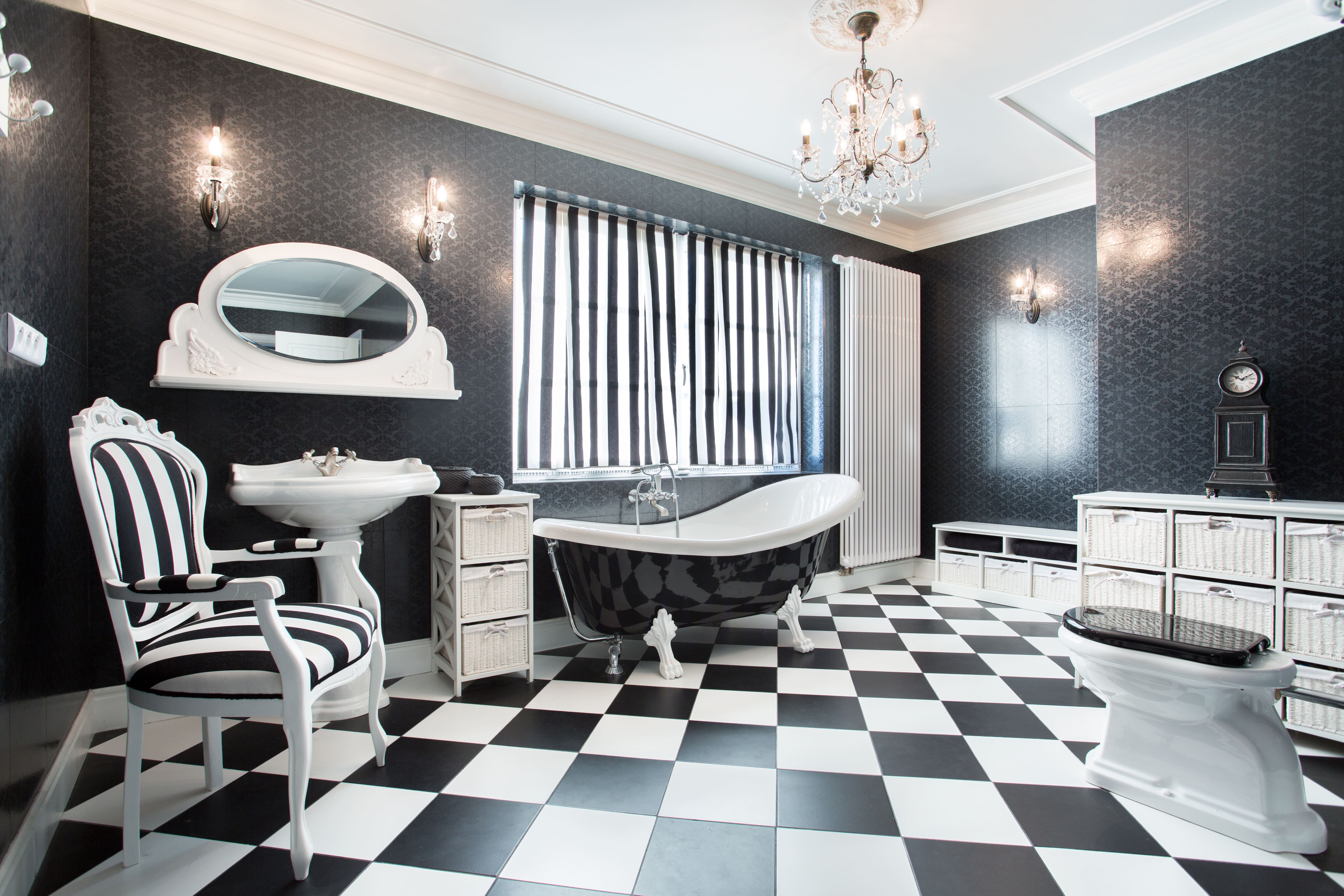 Modern black-and-white bathroom with black wallpaper and white fixtures