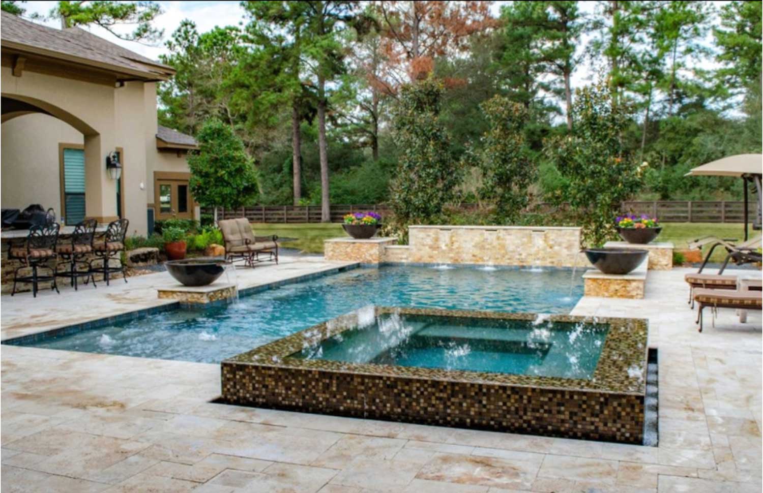 Pool with flagstone surround and hot tub