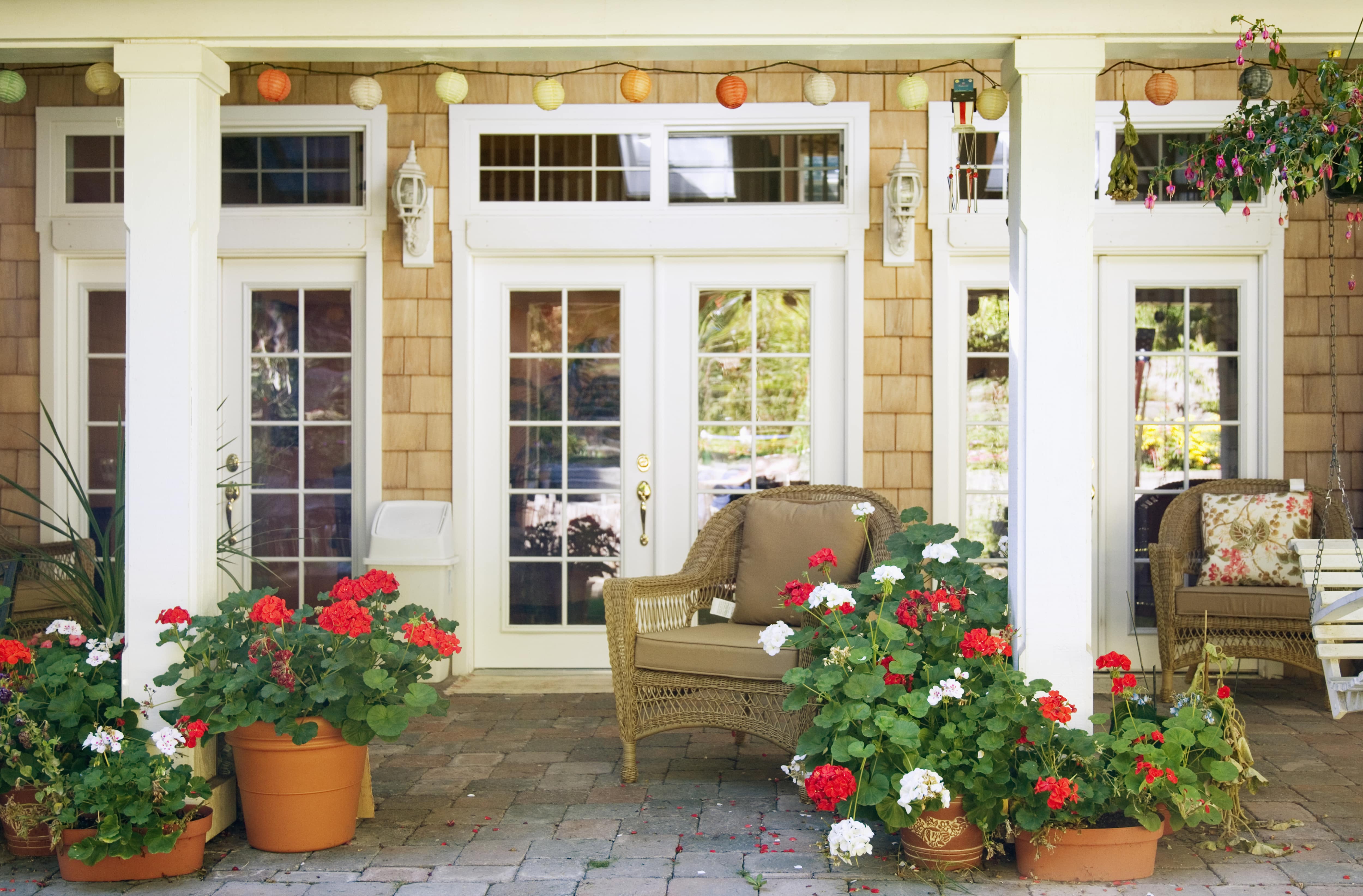 Colorful lanterns hung from covered porch