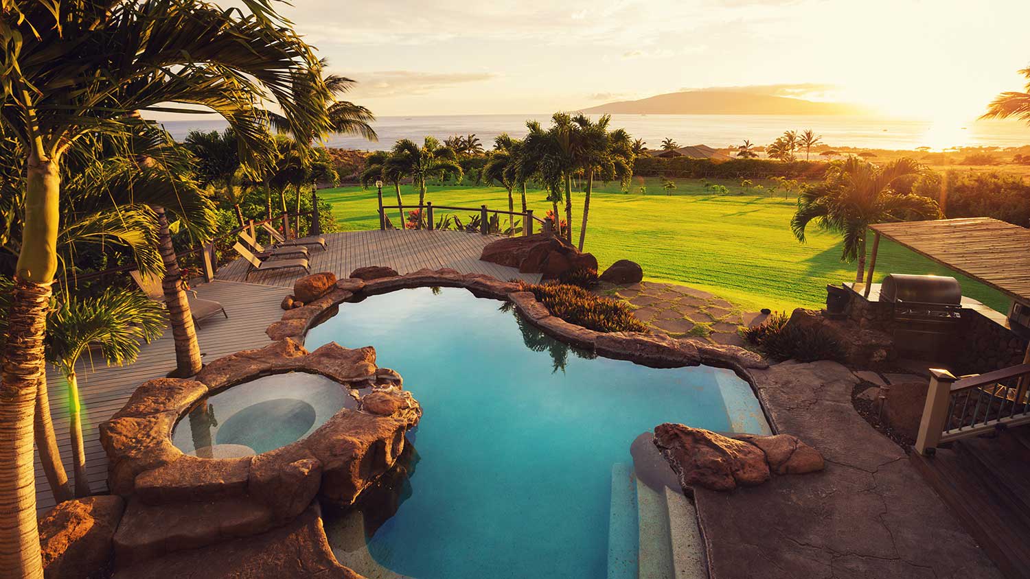 Free form swimming pool with view of the ocean