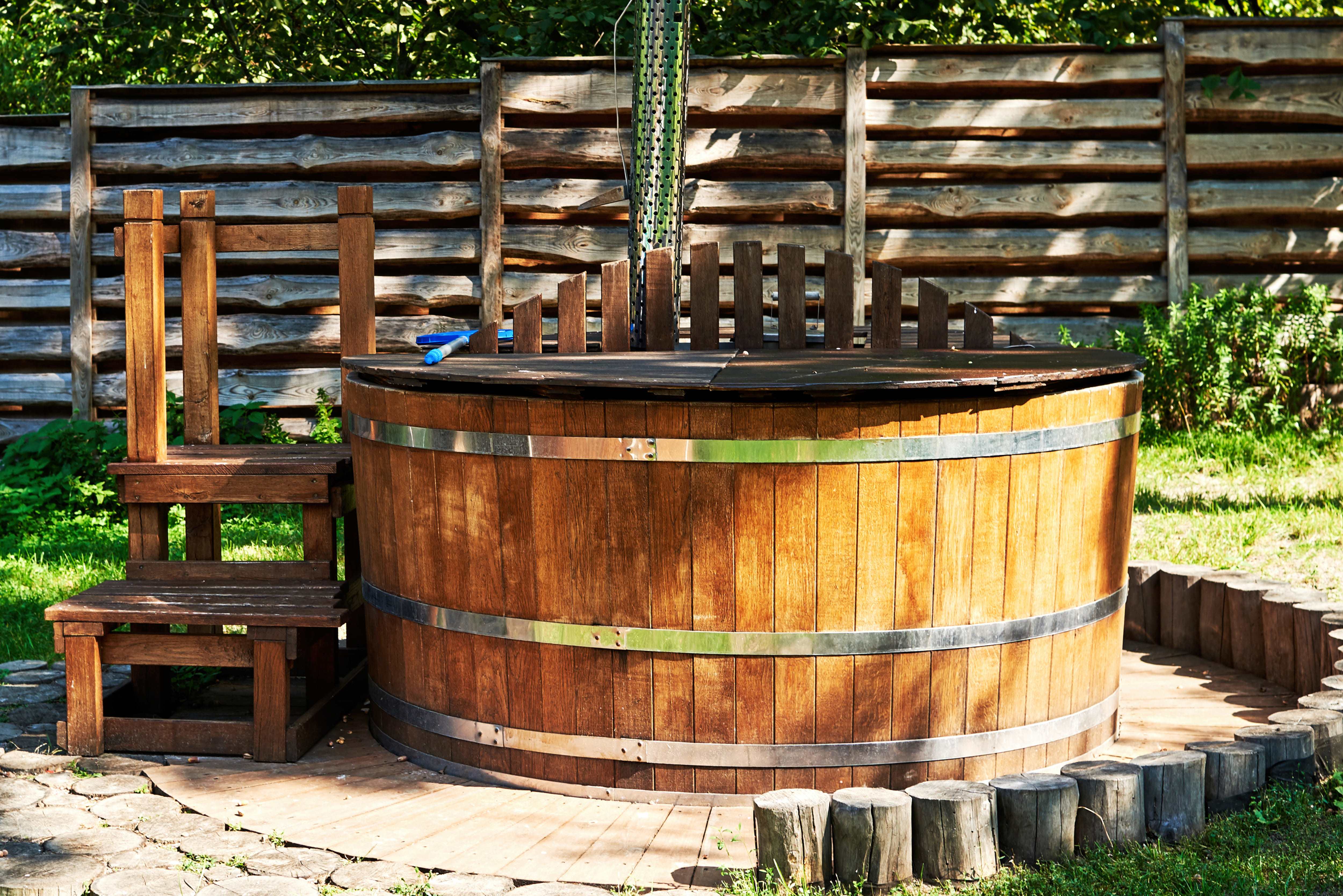 A small cedar-lined hot tub