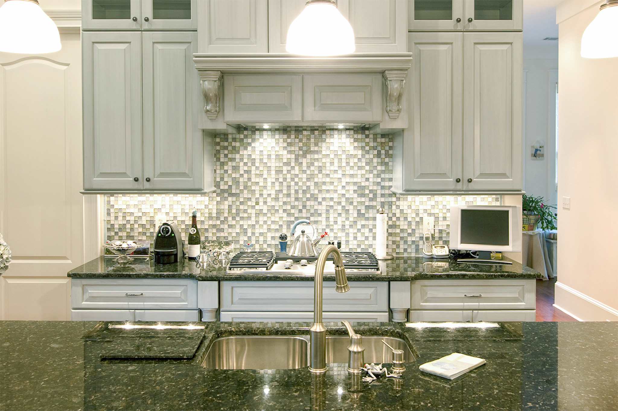 Kitchen with mosaic backsplash