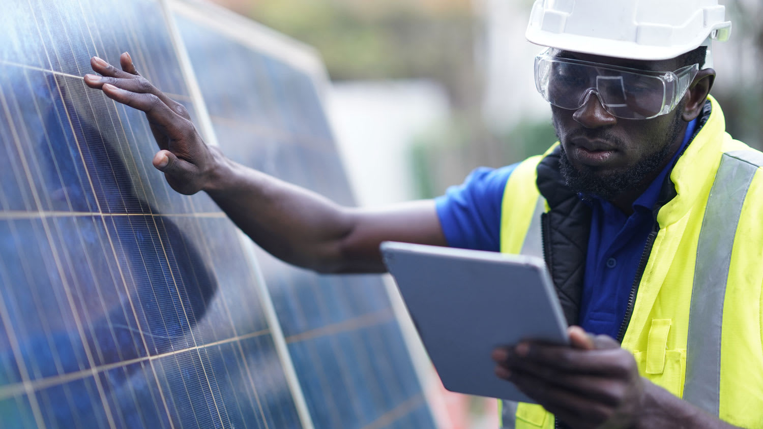 A professional installing a new solar panel
