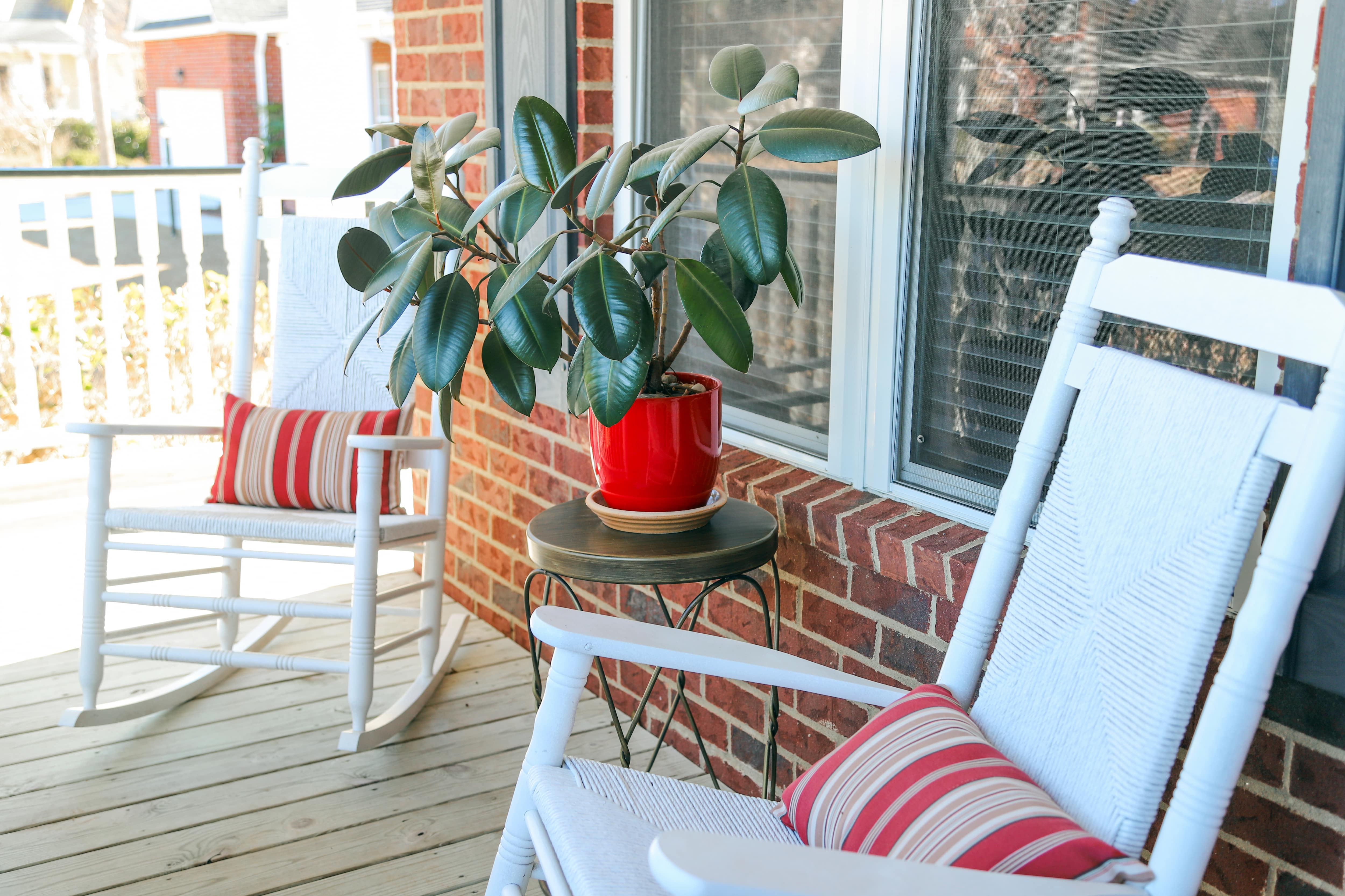 Front layered welcome mat with fall floral arrangement