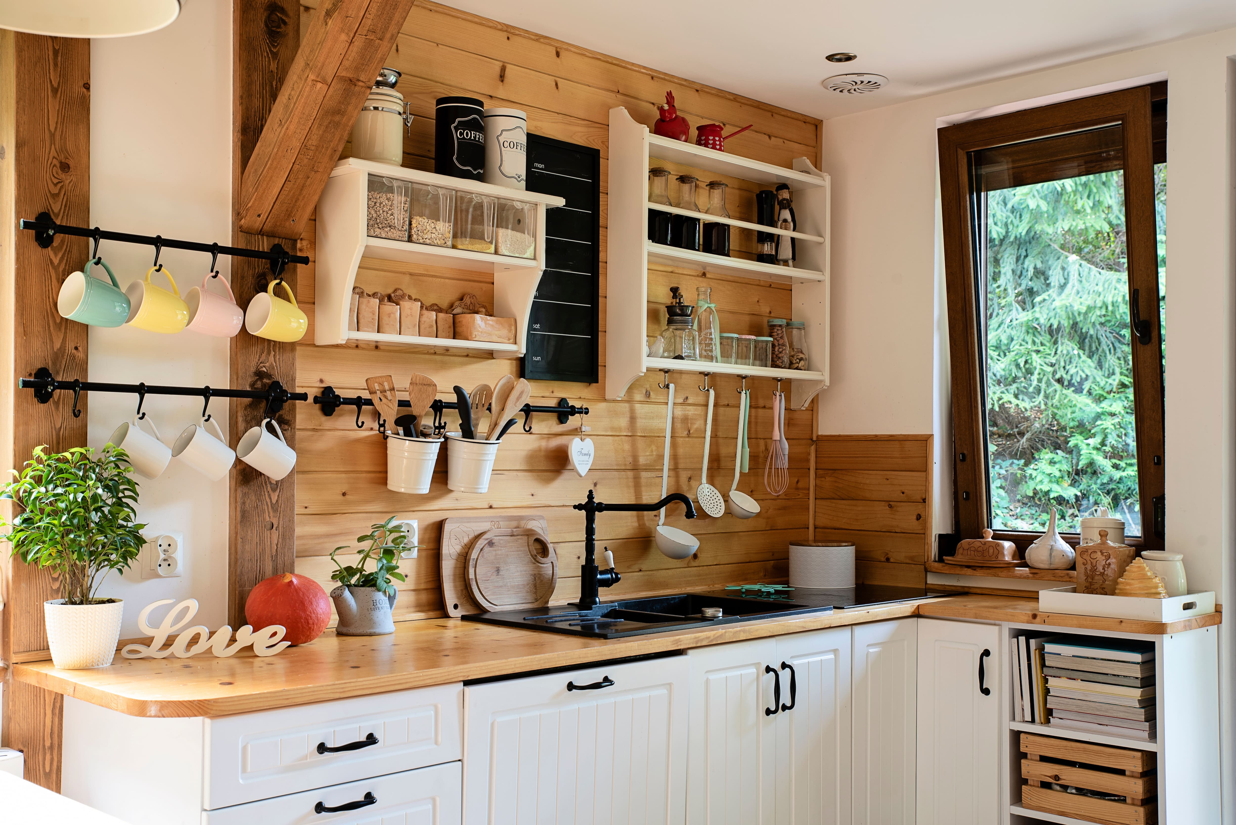 A small kitchen with multiple vertical storage options