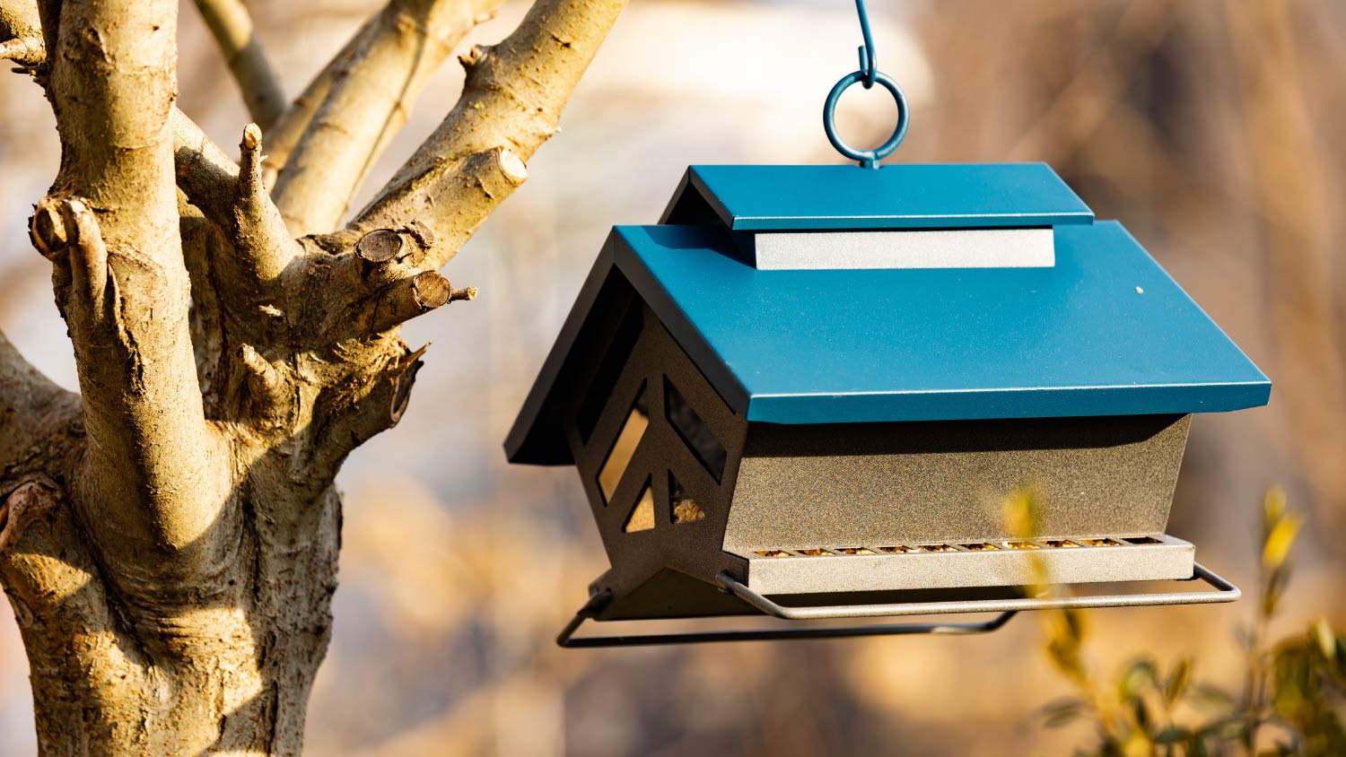 two-story green birdhouse