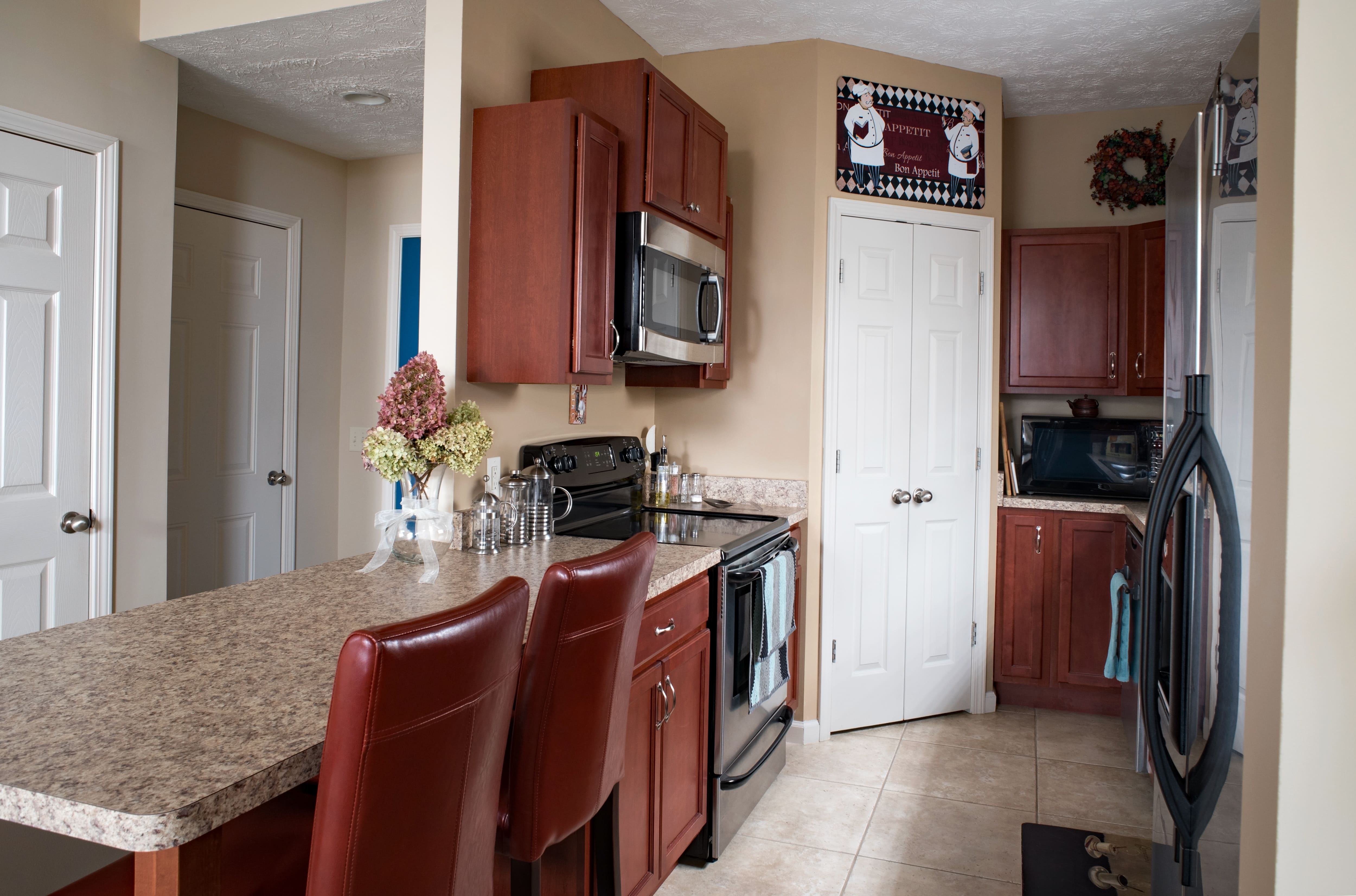 Modern condo with granite countertop that double as a table top