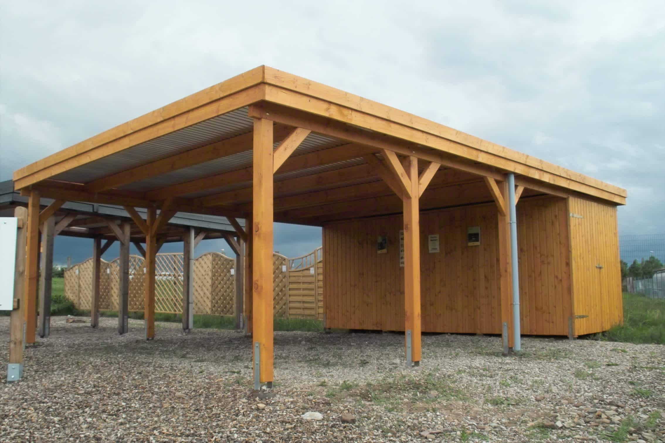 Large craftsman-style carport in yard