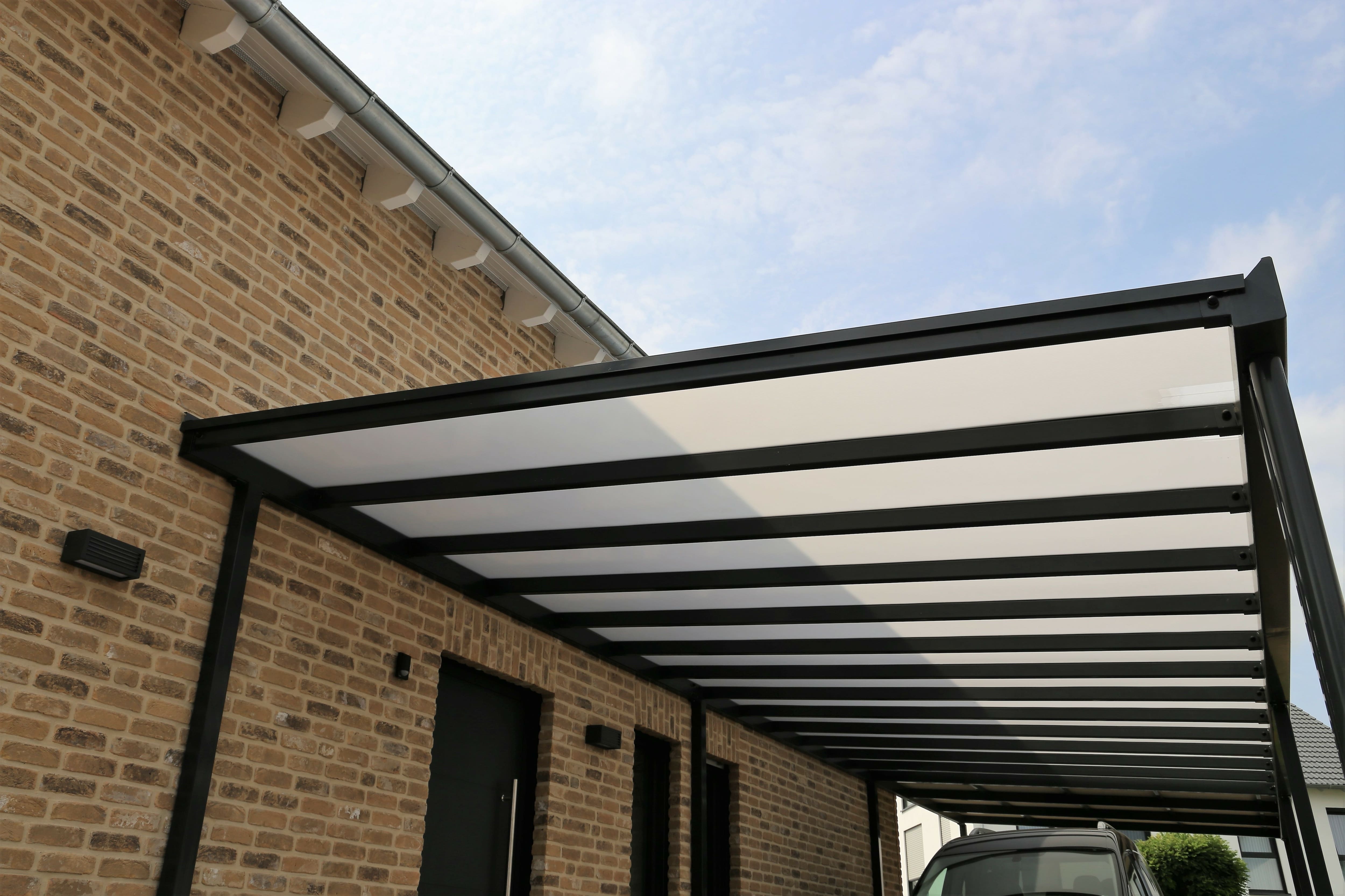 Shaded carport attached to home