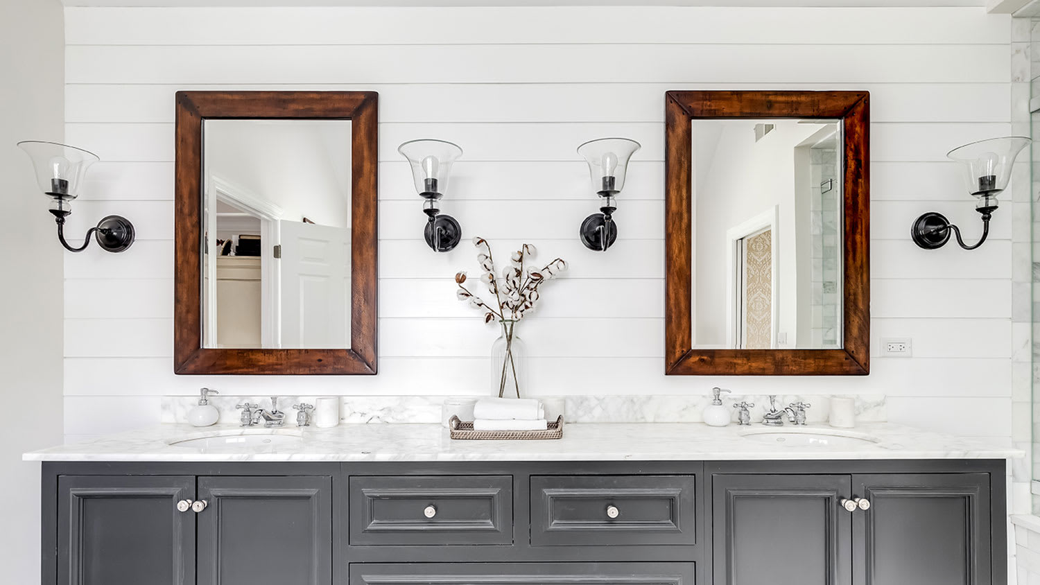 A view of a bathroom with shiplap