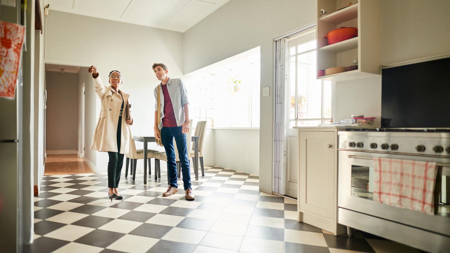 An inspector having a look at a house’s kitchen