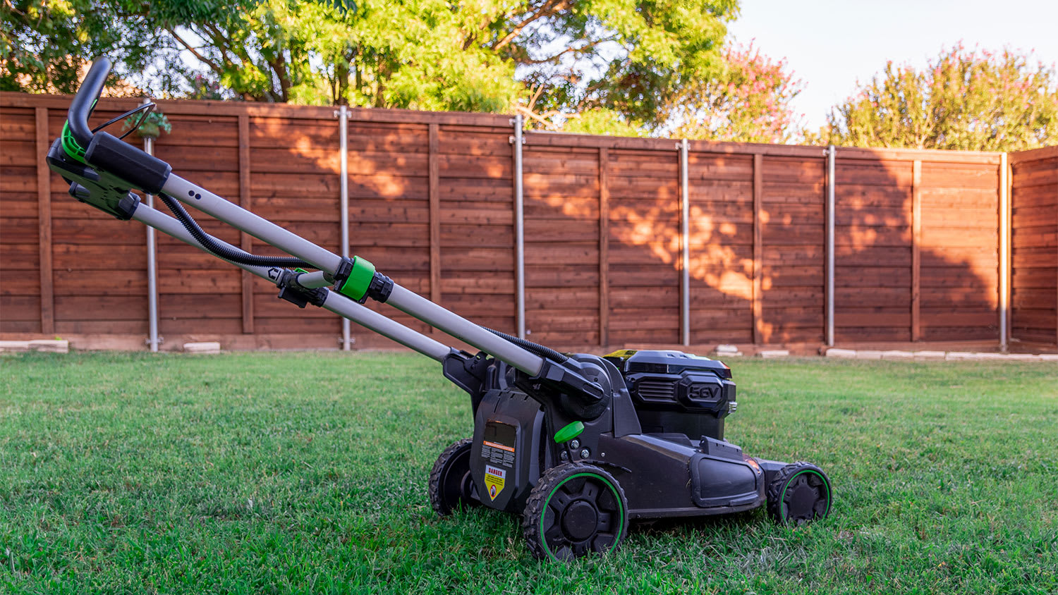 Lawn mower in backyard