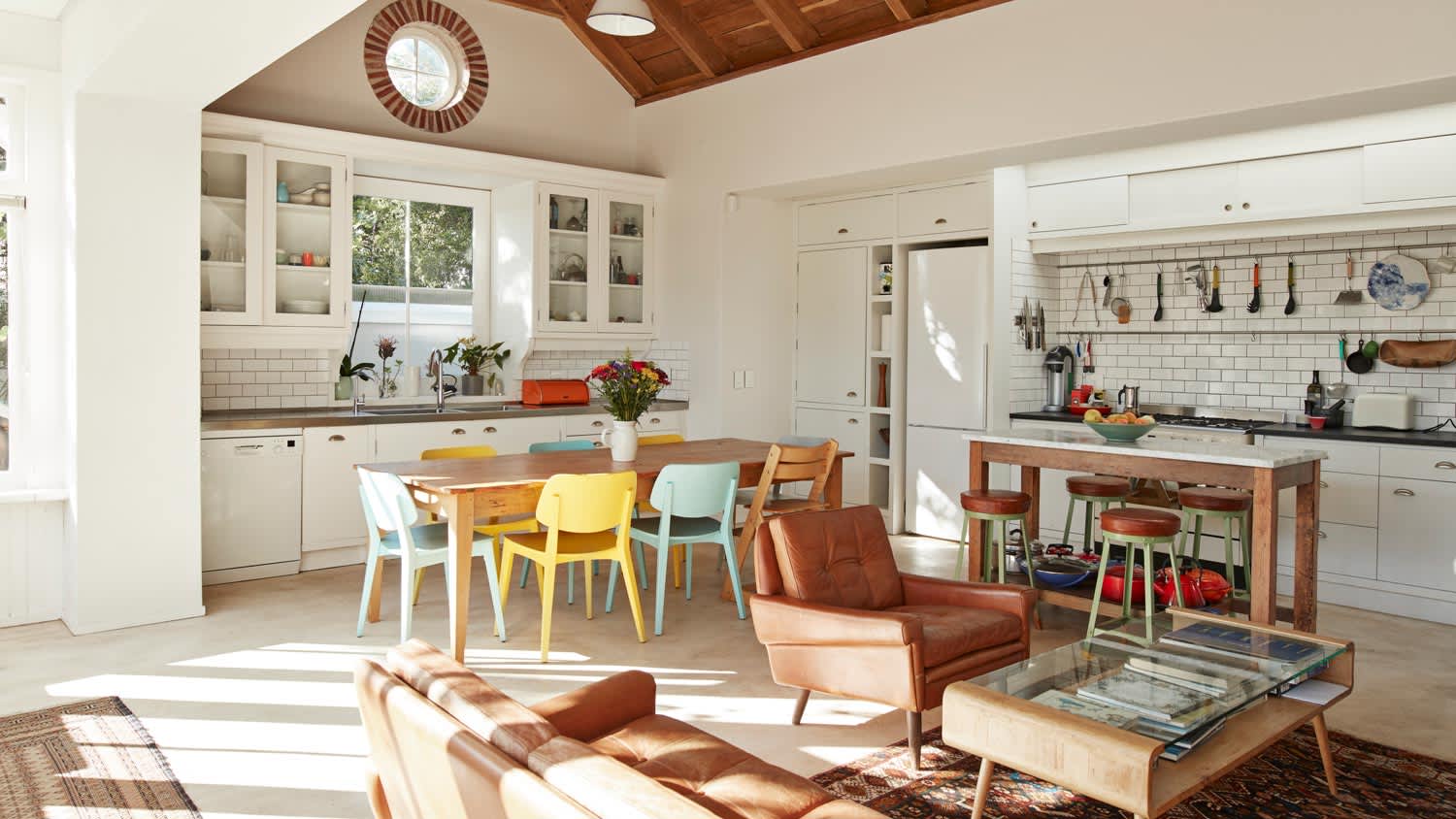 An open plan kitchen and living room in a house