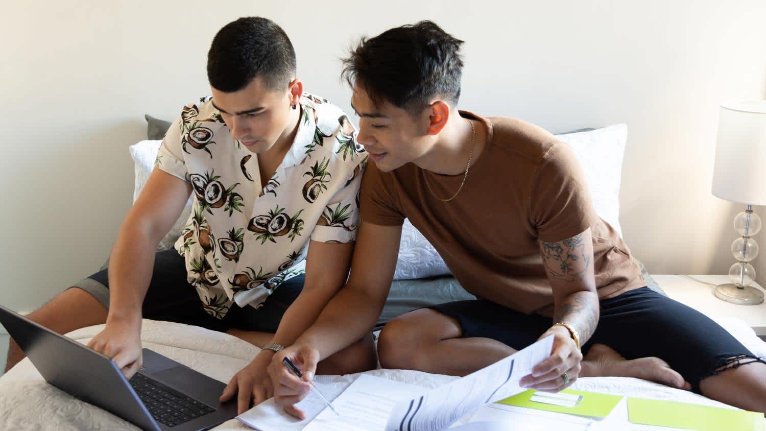 A couple checking its finances on a laptop