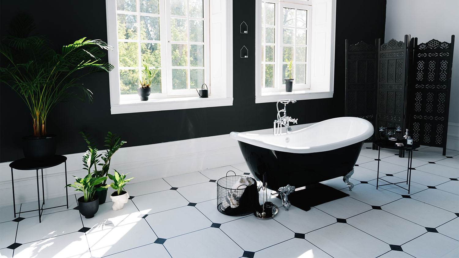 A view of a bathroom with tile flooring
