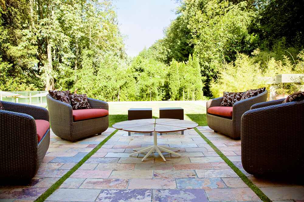 Modern patios with stone pavers and patio seating