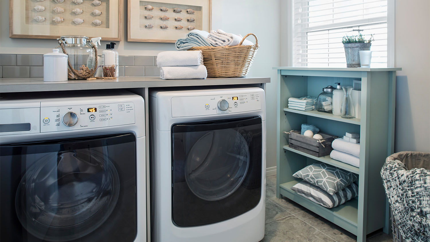 washer and dryer unit in laundry room