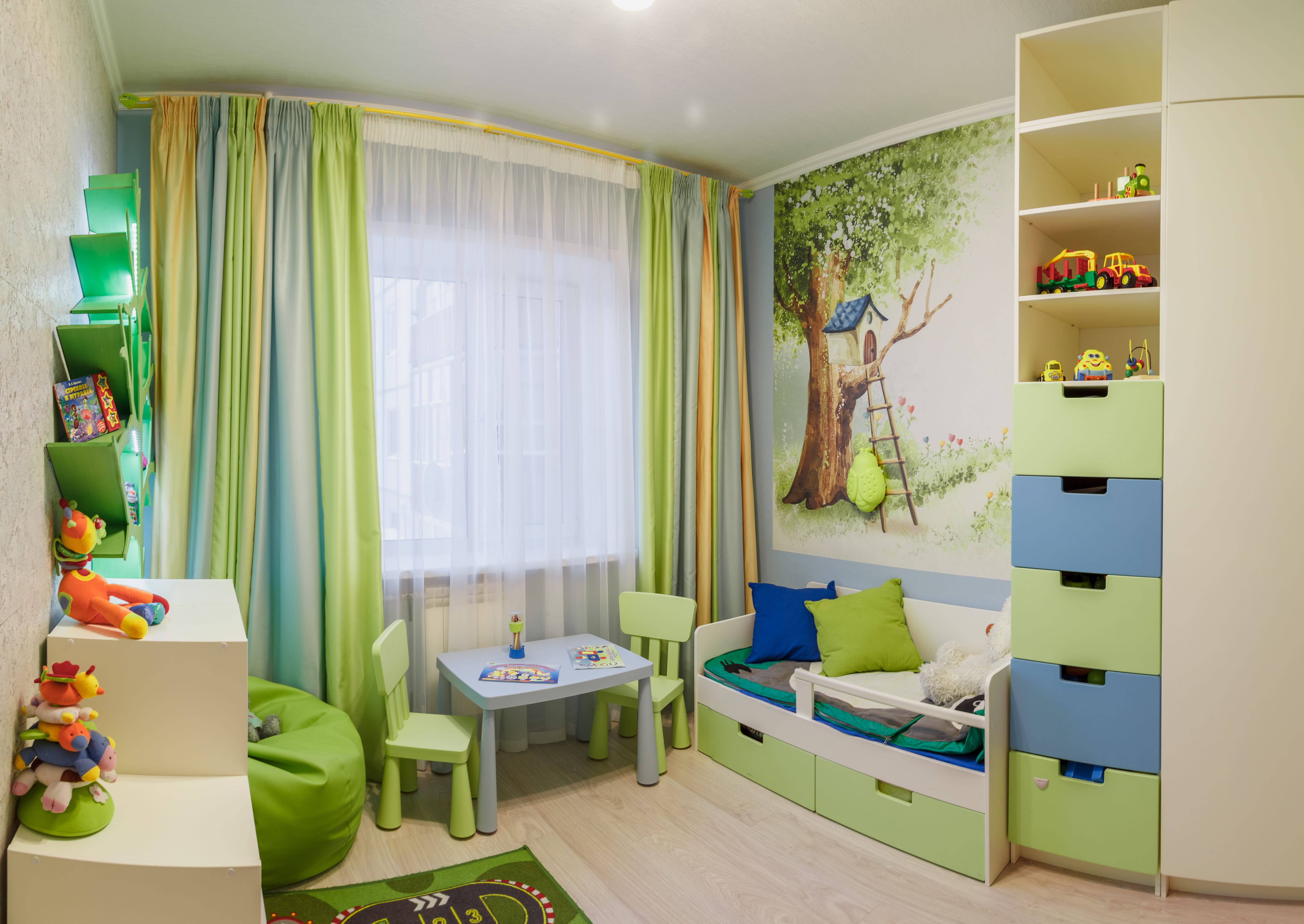 Child’s room with painted wall mural