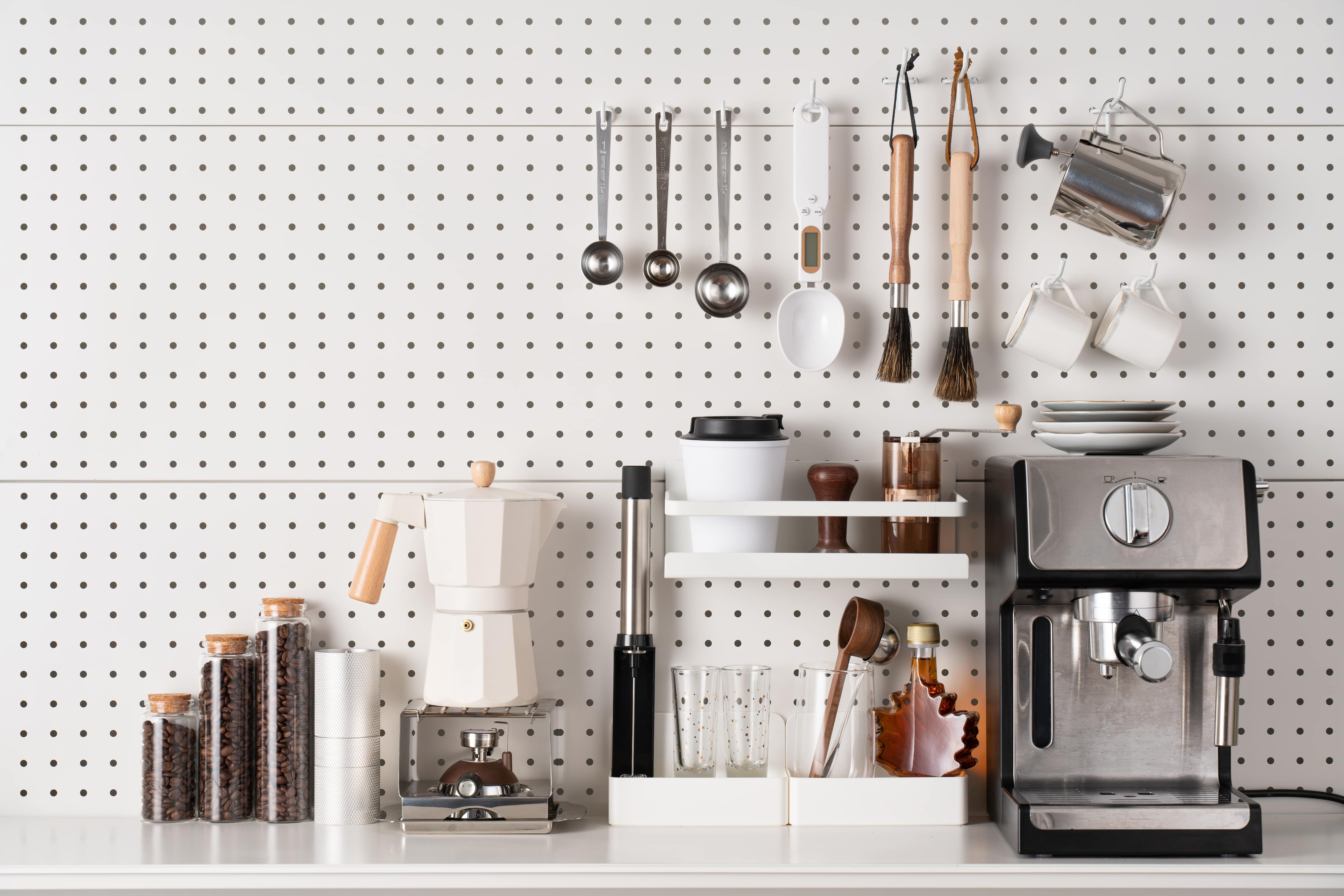 A home coffee bar with an espresso machine and accessories