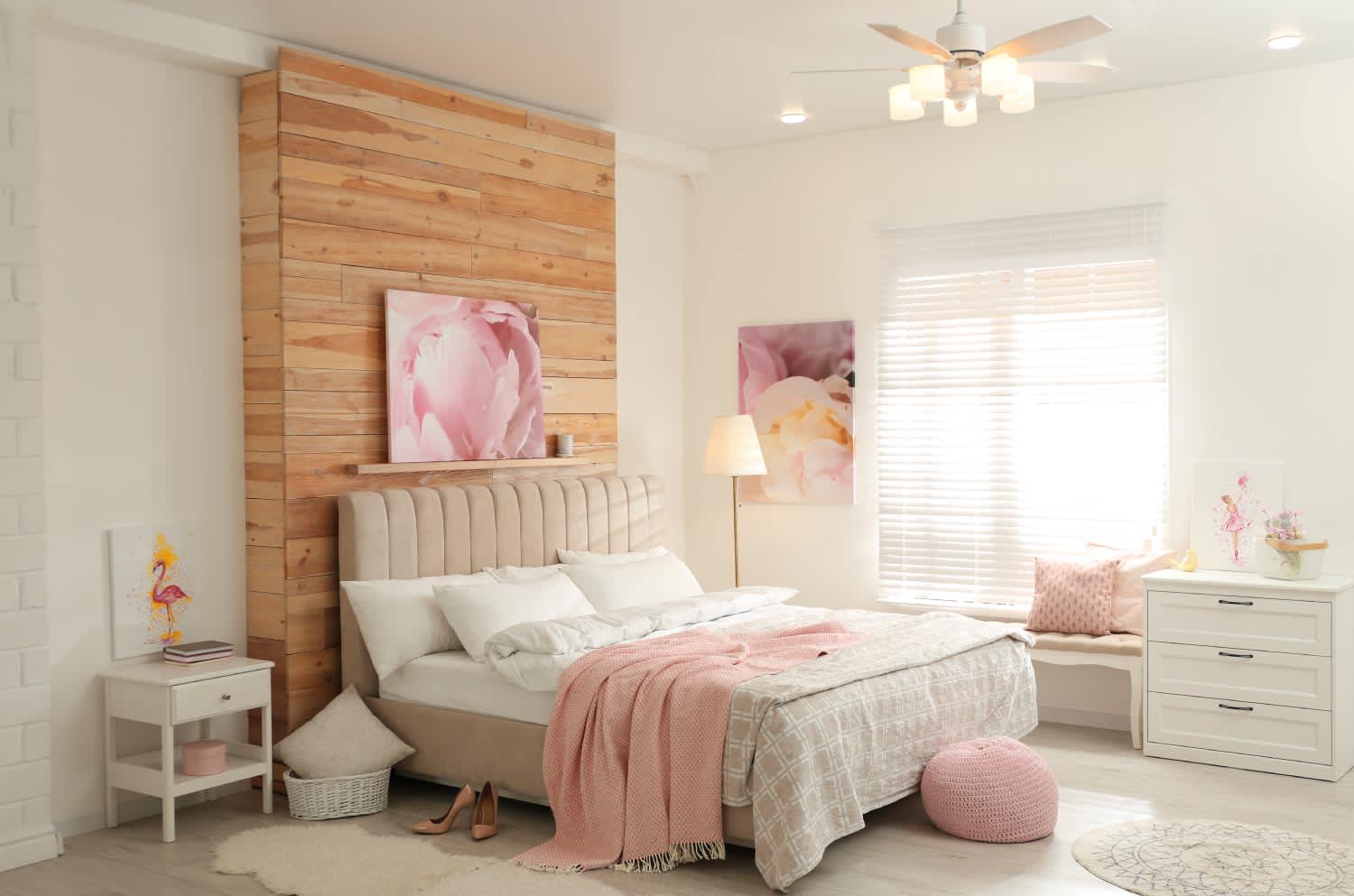 Pretty white and pink bedroom with modern ceiling fan