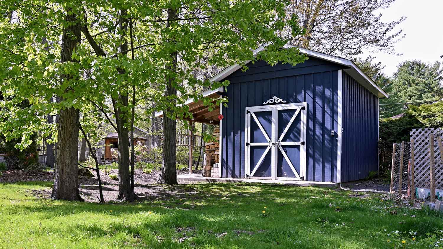 Large wooden shed in the backyard