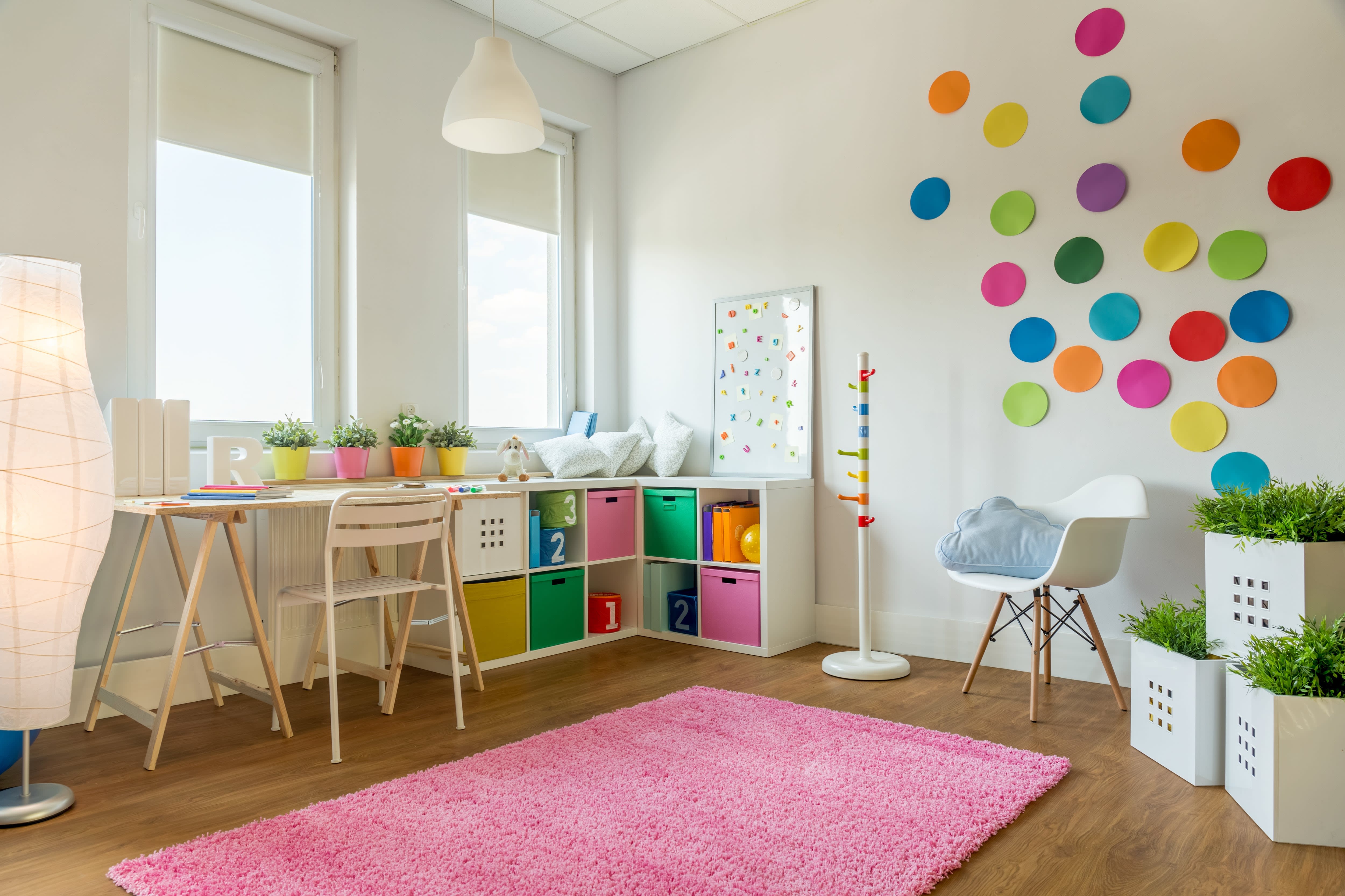 White kids’ room with bright accents