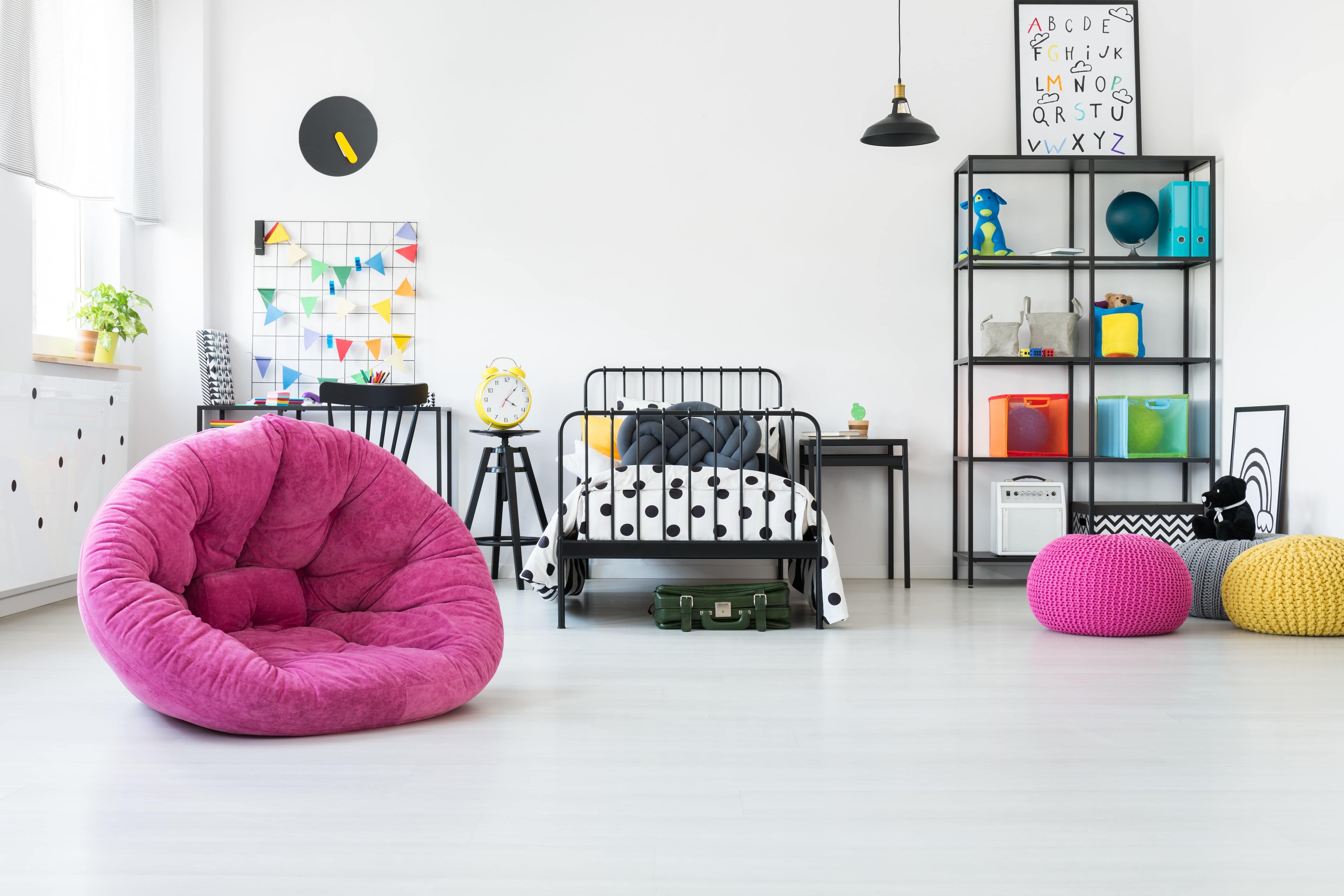 Pink bean bag chair in child’s bedroom