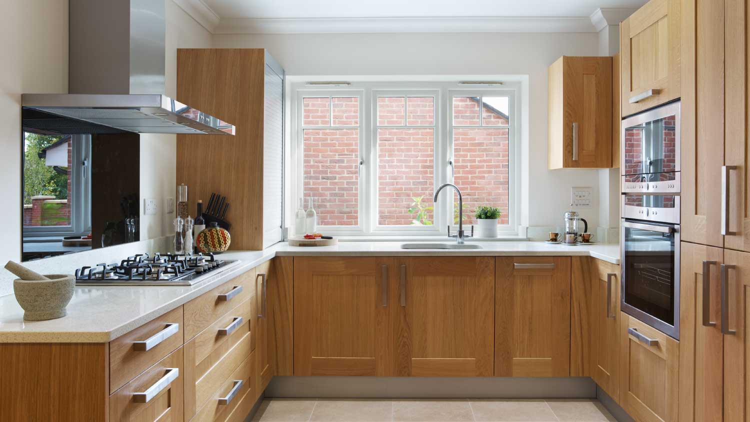 modern kitchen with oak cabinets