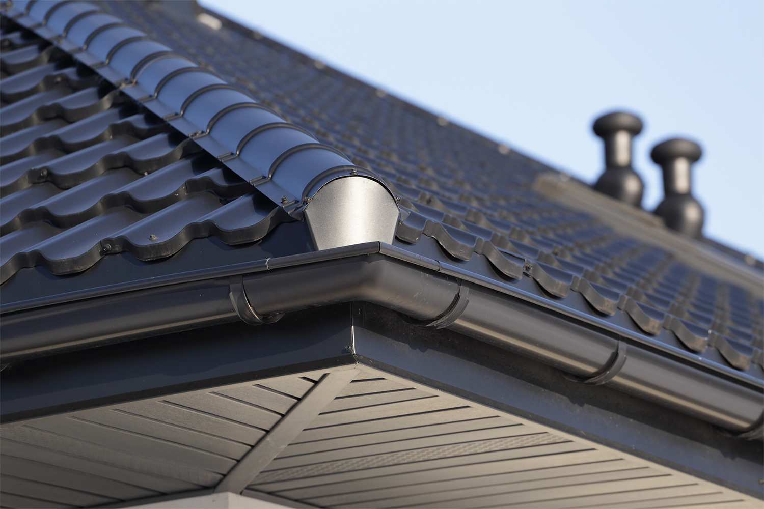 Corner view of steel gutter on house
