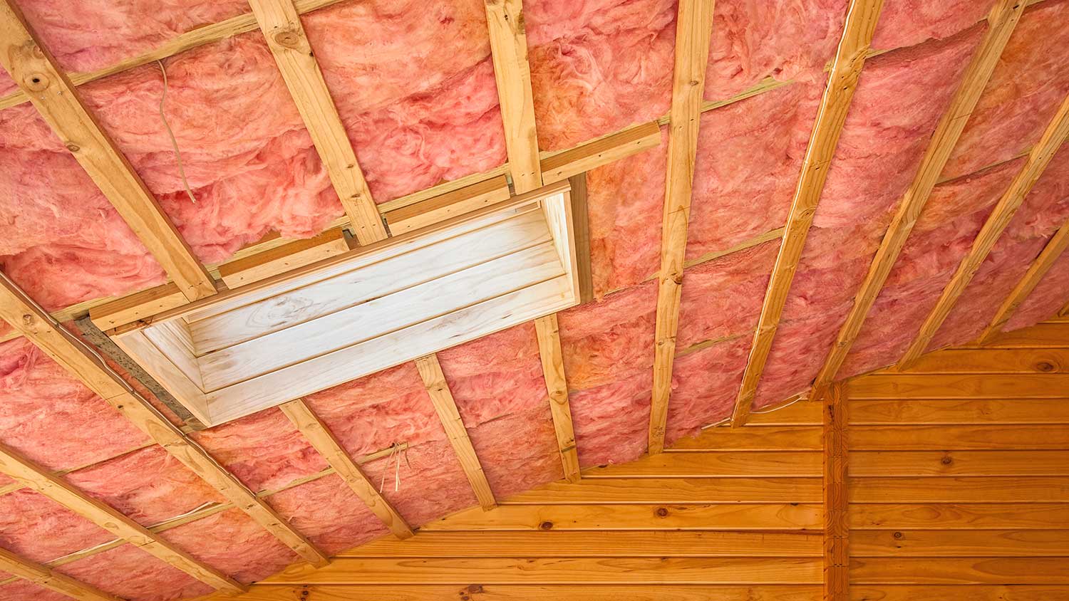 Fiberglass insulation installed in the attic