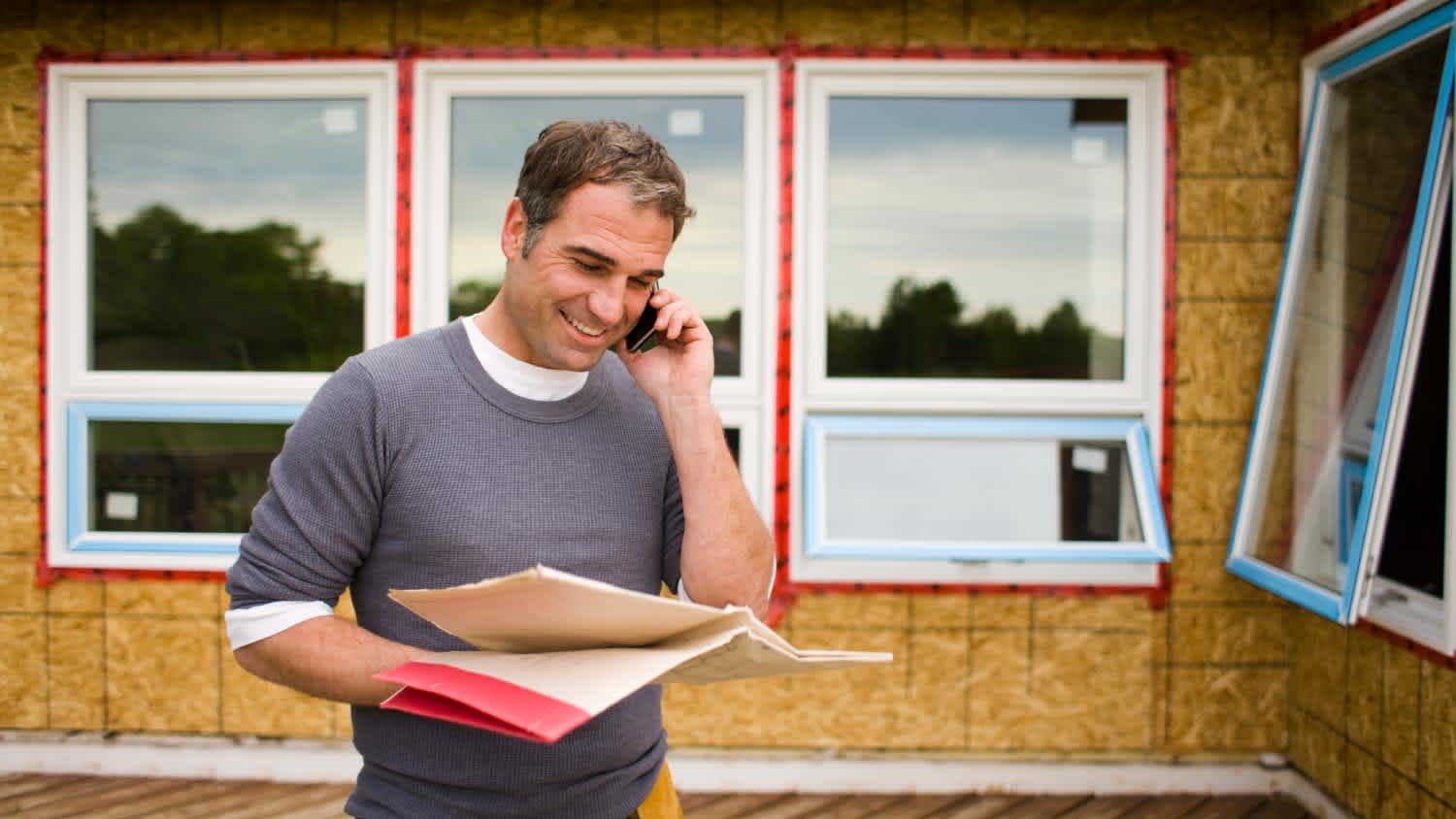 A contractor talking by phone