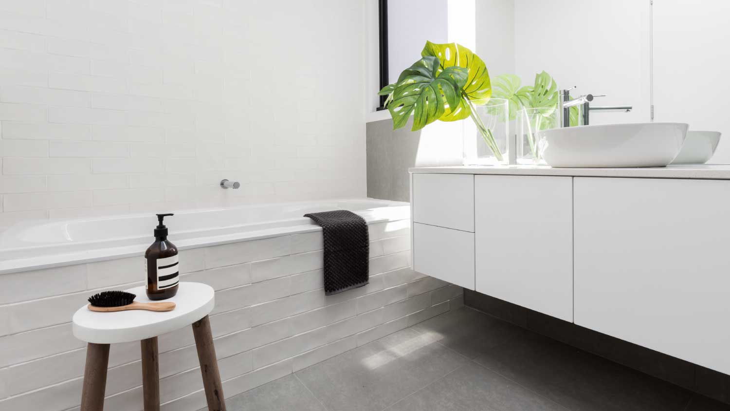 white bathroom with textured tile
