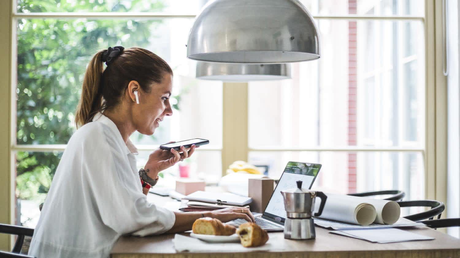 A woman talking by phone