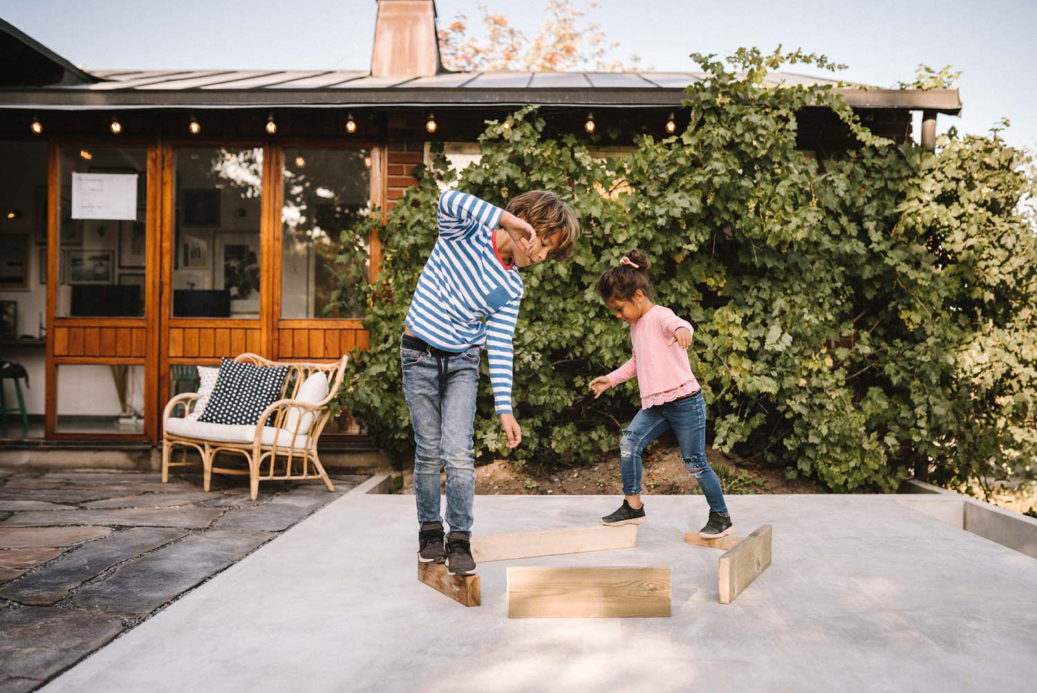 Siblings playing in the yard