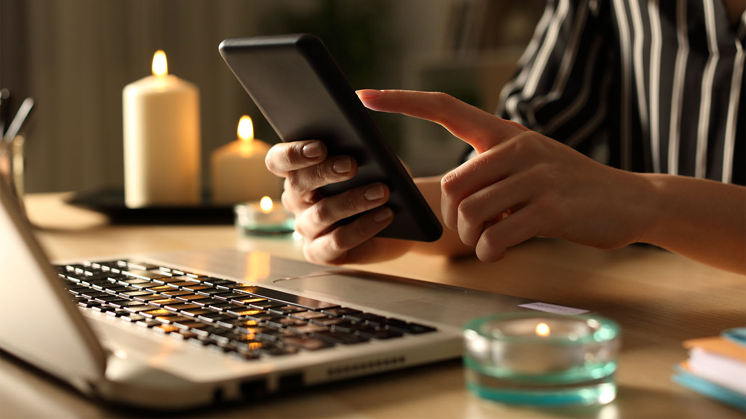 woman using phone to report power outage