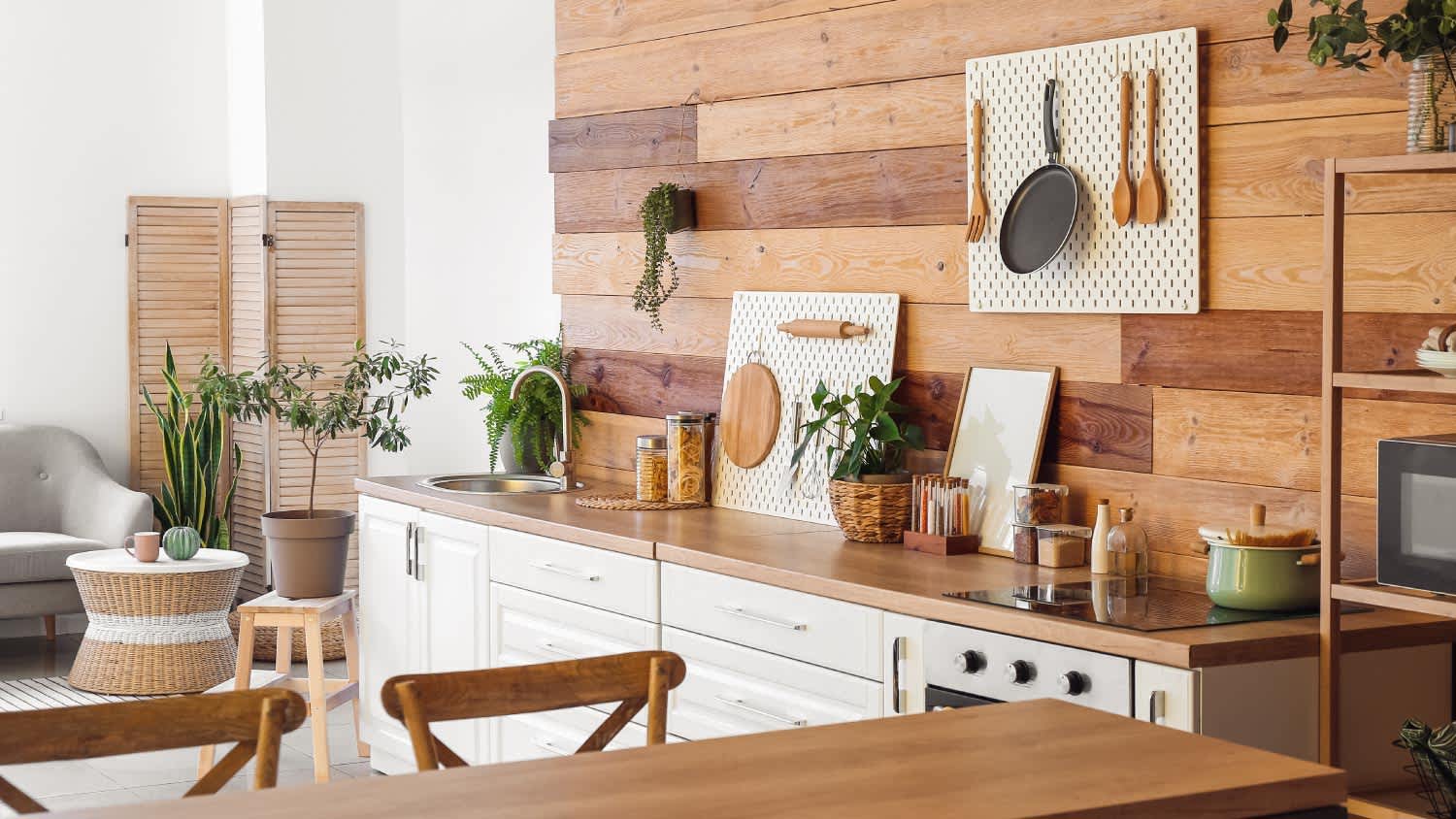 Interior of modern kitchen with white counters