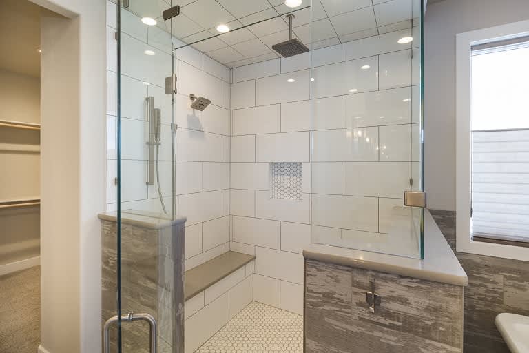 Steam shower with glass enclosure