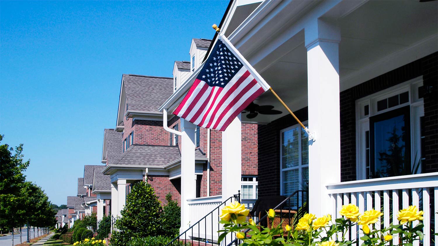 American flag flying on porch