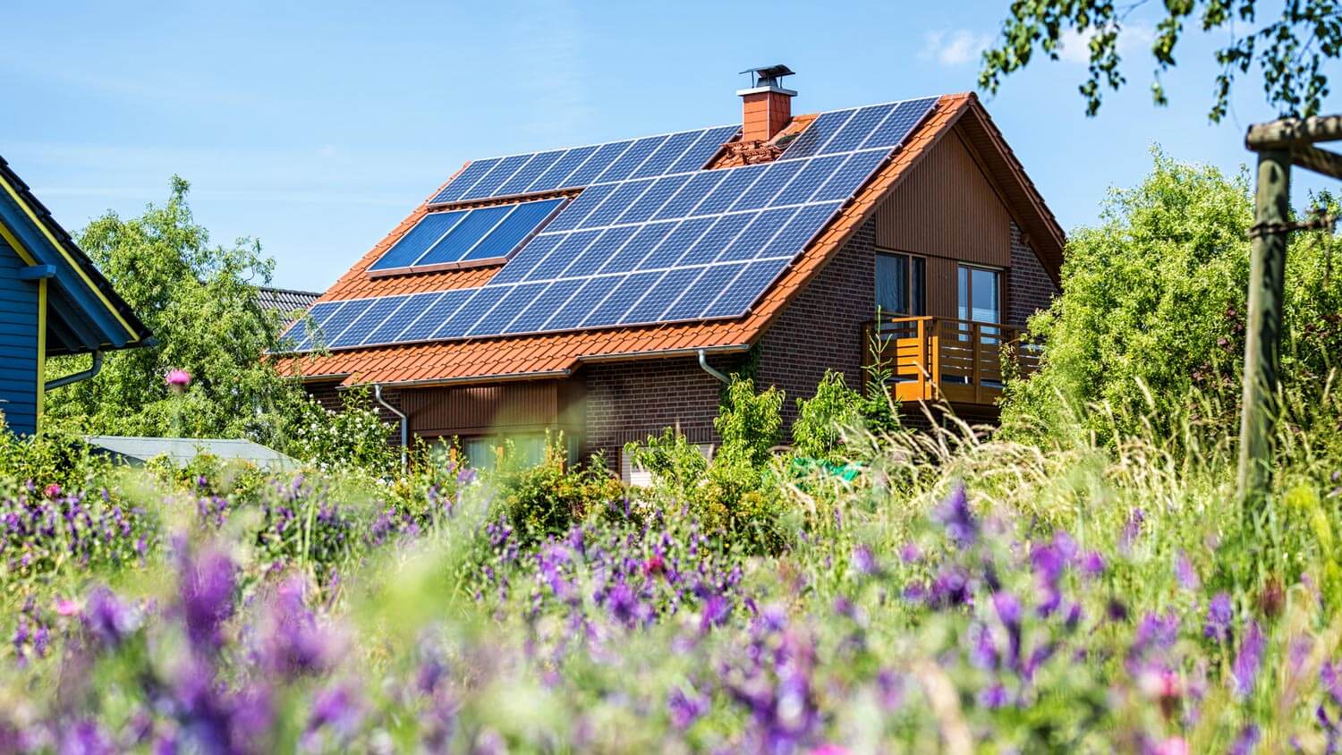 A house with solar panels during spring time