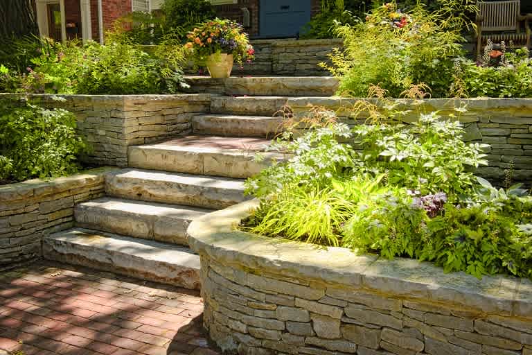 Natural stone steps with planters