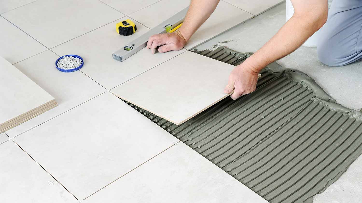 professional replacing floor tile