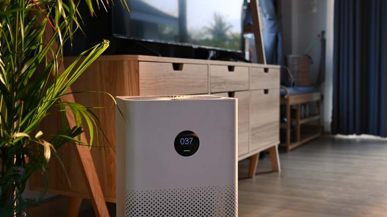 Portable A/C unit sitting in living room