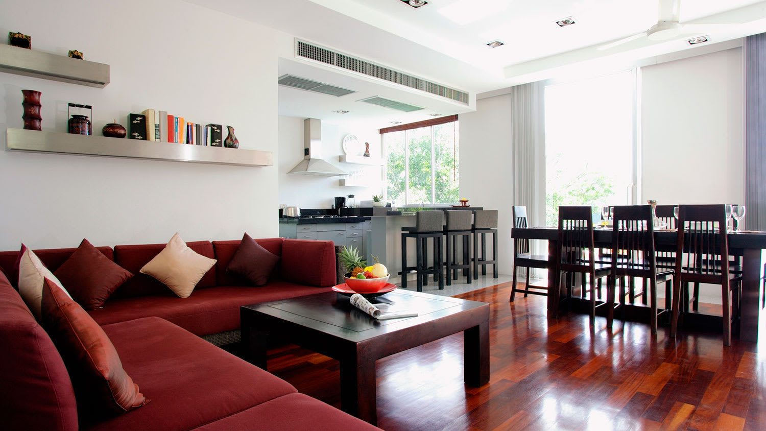 Open plan living room with air vents on the ceiling