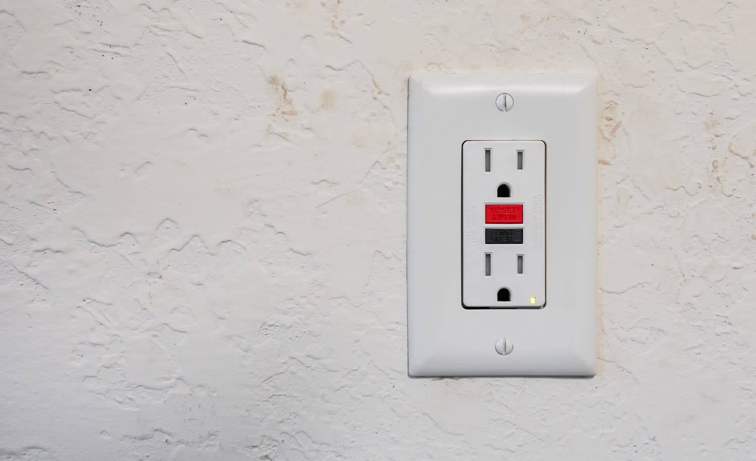 Ground fault interrupter electricity receptacle and wall plate.
