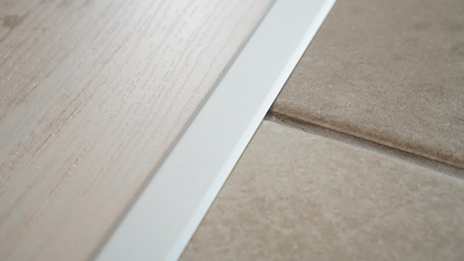 A laminate and tile transition