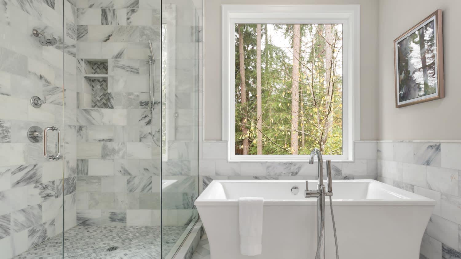 Bathroom with bathtub and shower