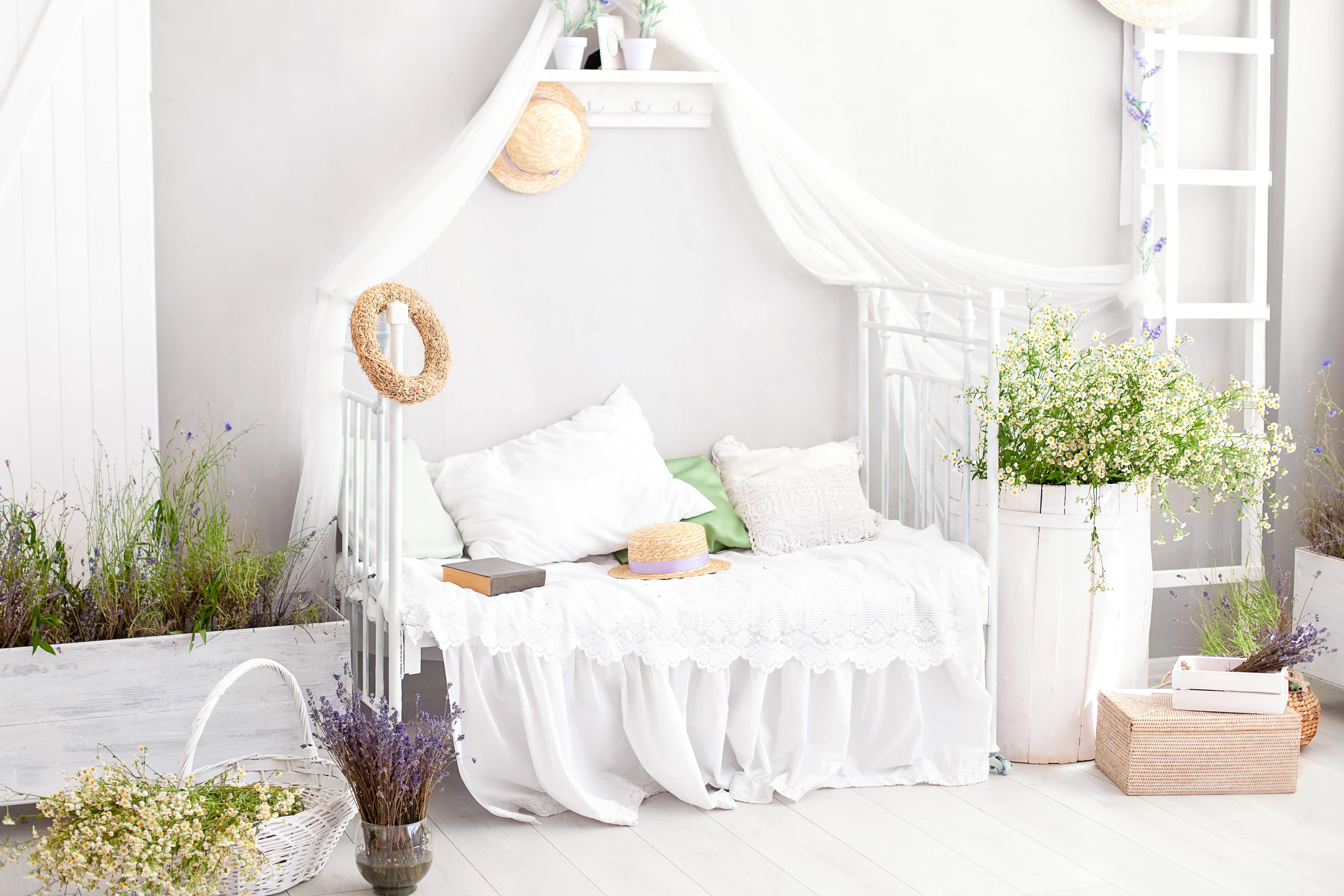 White daybed in rustic bedroom