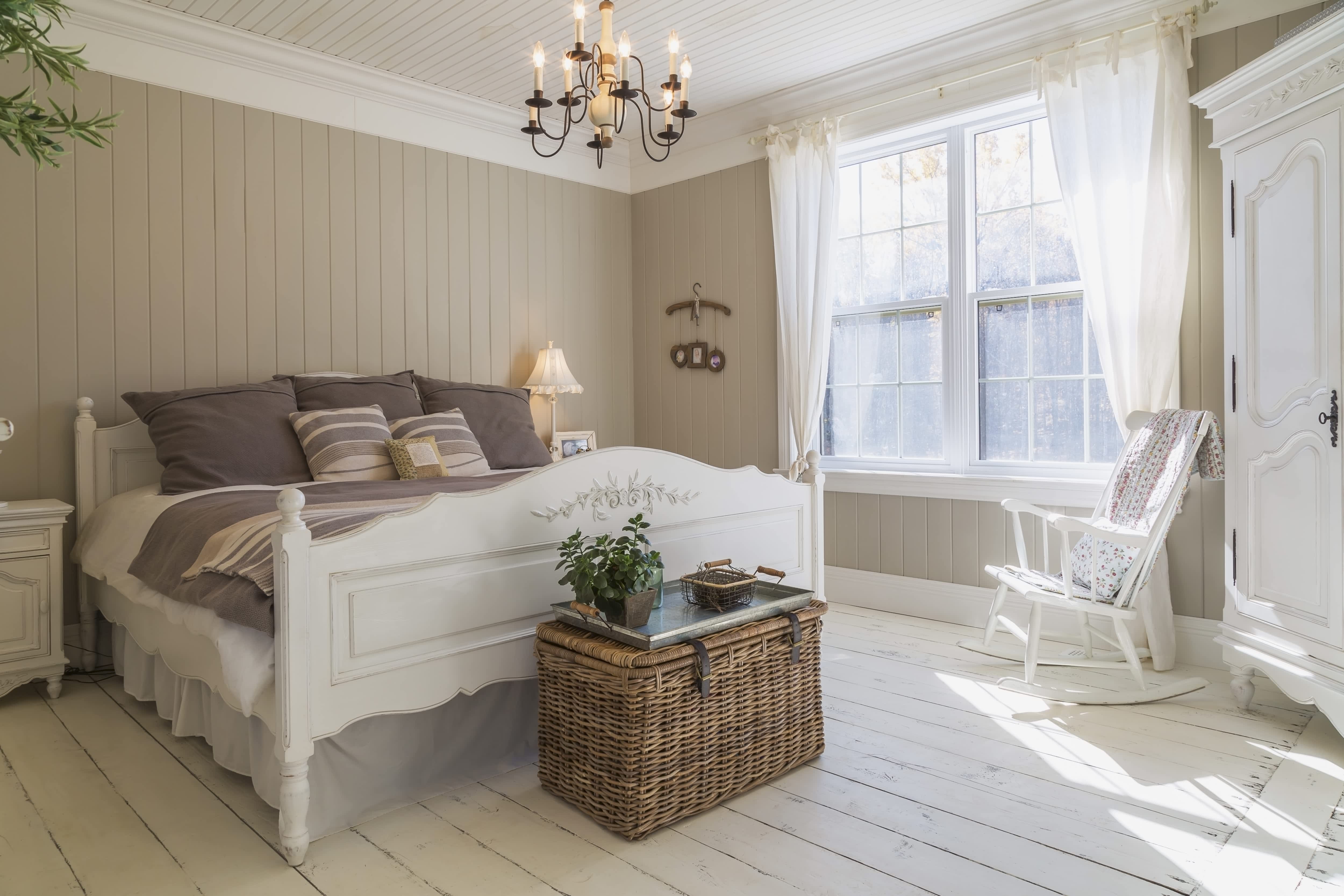 Painted white rocking chair in bedroom
