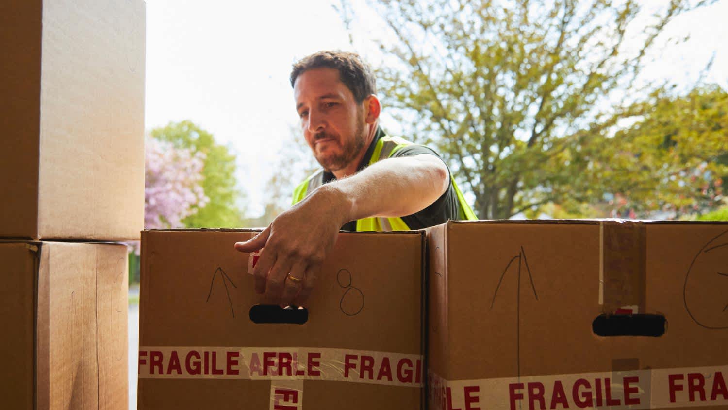 A man in van with boxes